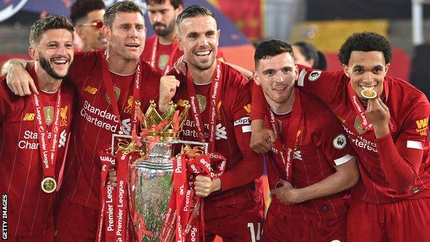 Adam Lallana with Liverpool team-mates Jordan Henderson, JAmes Milner, Andy Robertson and Trent Alexander-Arnold