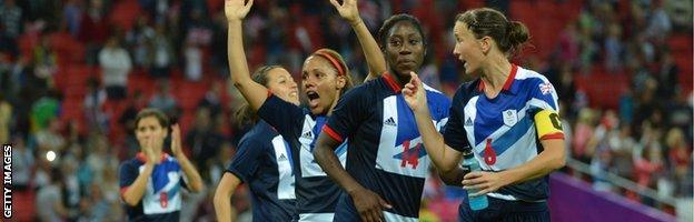 Great Britain defender Casey Stoney (right) celebrates with teammates during the London 2012 Olympic Games