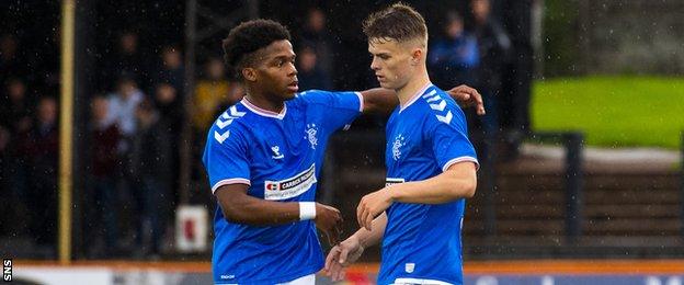 Rangers' Adedapo Awokoya-Mebude and Josh McPake celebrate