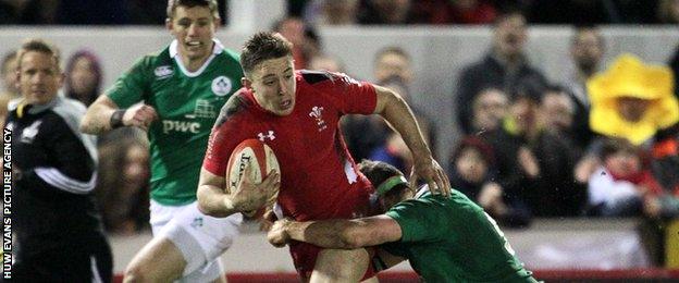 Josh Adams in action for Wales under-20 against Ireland in 2015