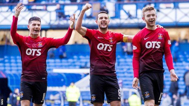 Kilmarnock's Jordan Jones, Gary Dicker and Stuart Findlay celebrate at Ibrox