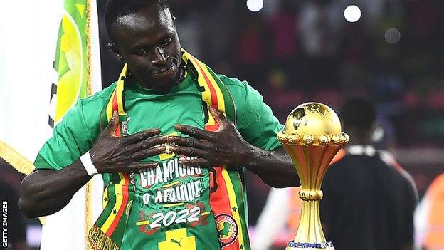 Senegal forward Sadio Mane with the Africa Cup of Nations Trophy