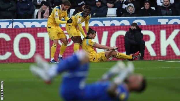 Andy Carroll performs a rowing celebration after scoring his first goal in almost 11 months