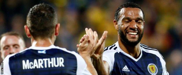 James McArthur and Matt Phillips celebrate