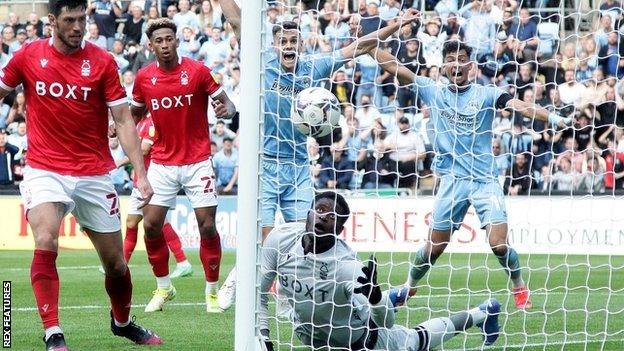 Forest keeper Brice Samba just failed to stop Kyle McFadzean's strike crossing the line