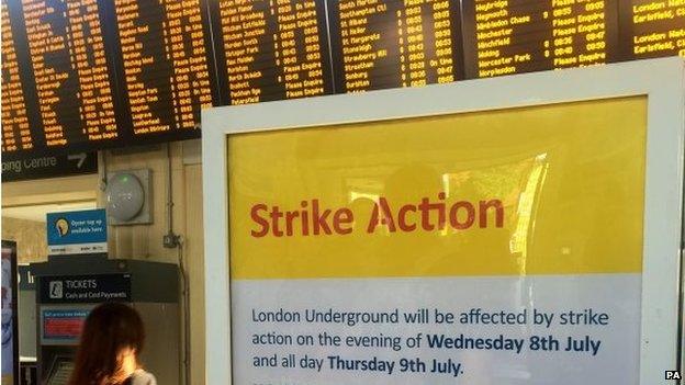 A strike action sign inside Wimbledon railway and underground station, London