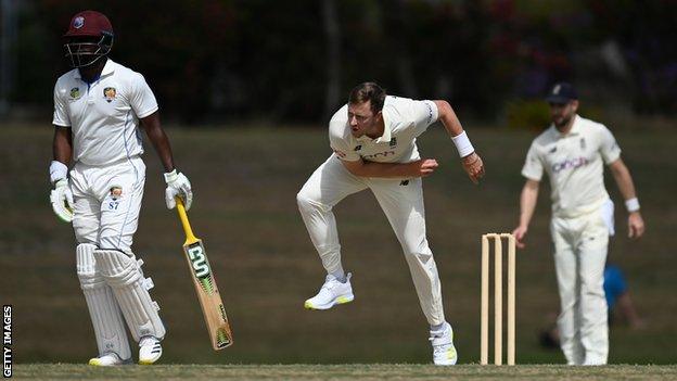 England seam bowler Ollie Robinson bowls against a Cricket West Indies President's XI in Antigua