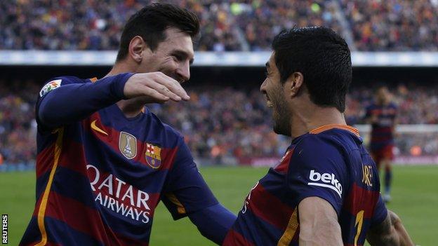 Lionel Messi and Luis Suarez celebrate against Atletico Madrid