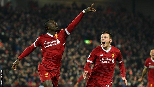 Sadio Mane celebrates with Andrew Robertson