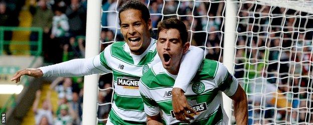 Celtic's Nir Bitton (right) celebrates scoring against Malmo