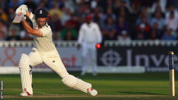 Alastair Cook drives through the off side