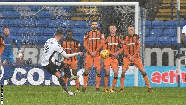 Bolton's Gary Madine scores a free-kick against Hull City