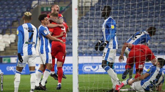 Mark Roberts scores against Huddersfield Town