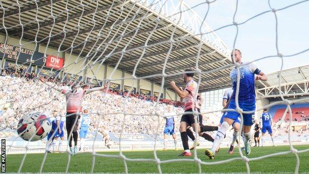 Tom Ince scores for Reading against Wigan