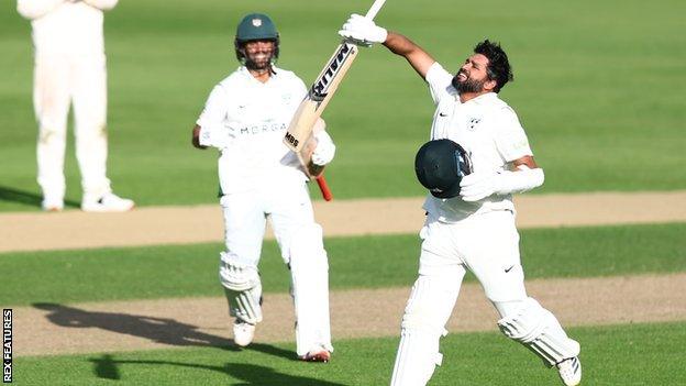 Worcestershire batter Azhar Ali (right) celebrates scoring a double century