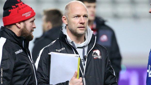 Duncan Hodge talks to his assistant coach Stevie Scott (left)