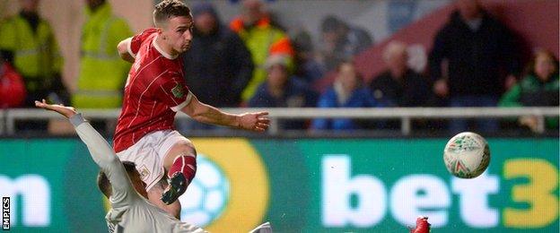 Joe Bryan scores Bristol City's opening goal against Manchester United