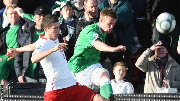 Poland's Robert Lewandowski battles with Northern Ireland's Chris Brunt during the World Cup qualifier at Windsor Park in March 2009