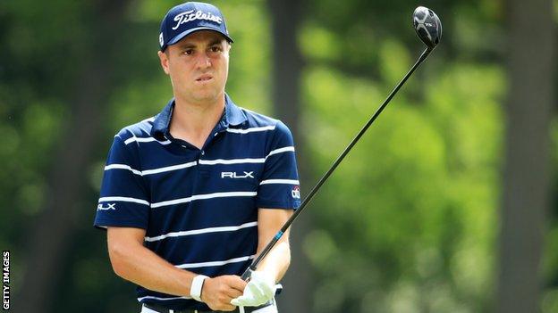 American golfer Justin Thomas prepares to hit a tee shot