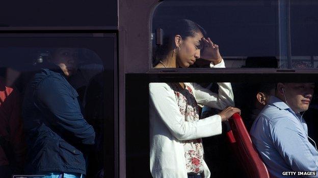 Commuters on bus in Bogota, Colombia