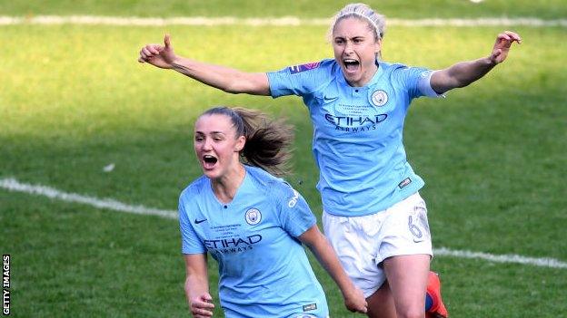 Manchester City women players Georgia Stanway (left) and Steph Houghton (right) celebrate winning the 2019 League Cup final