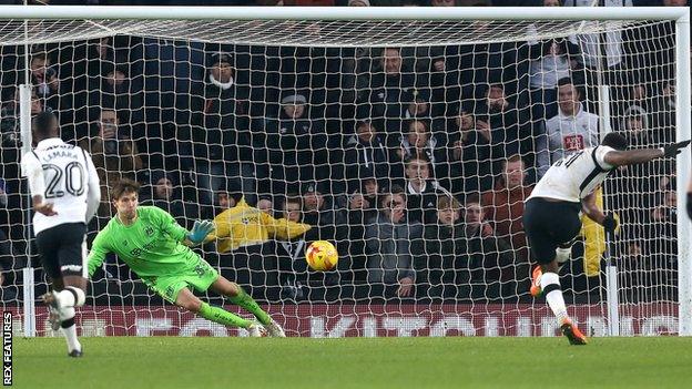 Darren Bent scores from the penalty spot