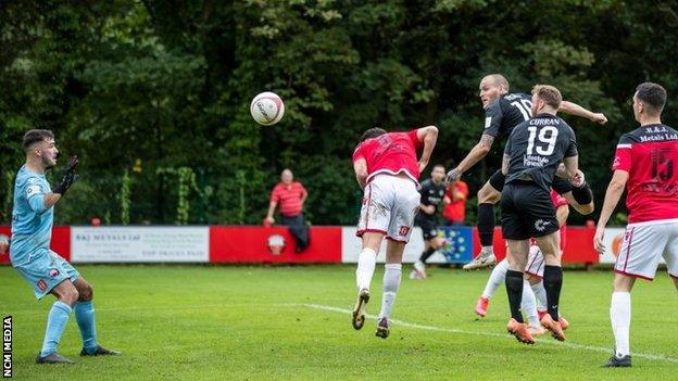 Jamie Insall scores Connah's Quay's second goal