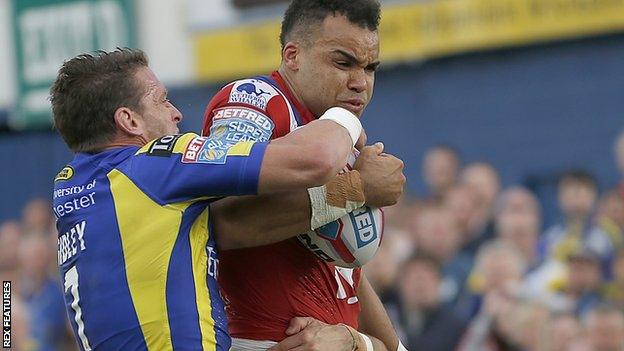 Mason Caton-Brown is tackled by Kurt Gidley