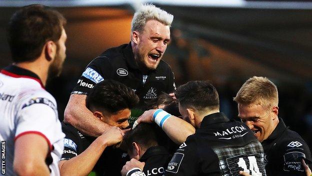 Stuart Hogg celebrates with Glasgow