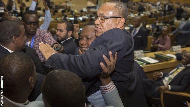 New Caf president Ahmad is held aloft