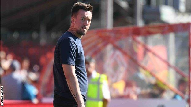 Ian Burchnall in the dugout for Forest Green Rovers