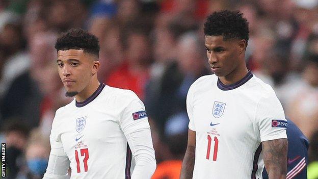 England forward Jadon Sancho (left) and Marcus Rashford (right) prepare to be subbed on during extra time of the Euro 2020 final against Italy