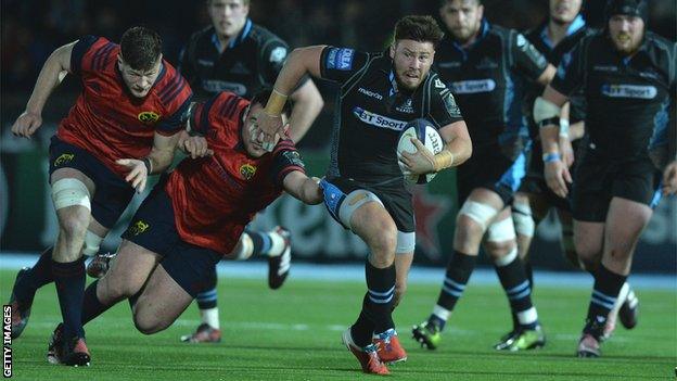 Glasgow scrum-half Ali Price breaks clear of the Munster defence