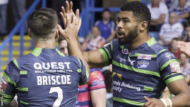 Kallum Watkins celebrates one of his tries for Leeds Rhinos against Featherstone