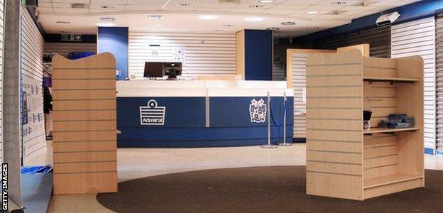 The Bury FC club shop at Gigg Lane lies desolate during a summer of financial turmoil at the club