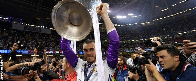 Gareth Bale with the Uefa Champions league trophy