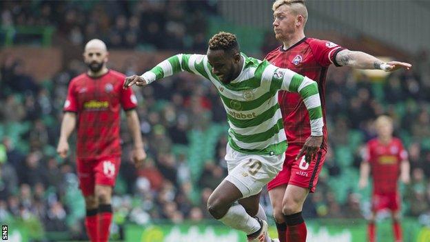 Celtic striker Moussa Dembele is fouled by Morton's Michael Doyle