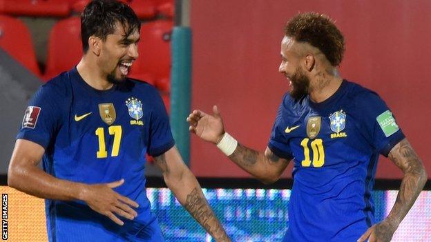 Brazil international players Lucas Paqueta and Neymar celebrate