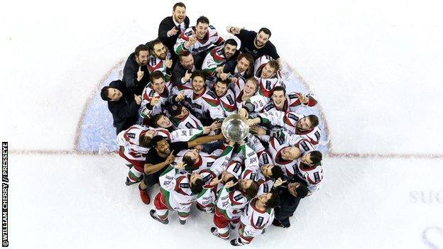 Cardiff Devils team celebrate with trophy