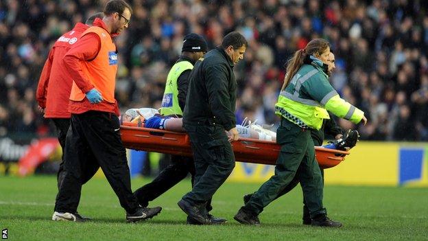 George Kruis being stretchered off the pitch on Saturday