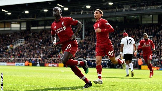 Sadio Mane celebrates scoring Liverpool's opening goal in victory over Fulham