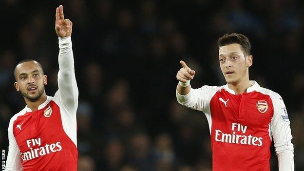 Mesut Ozil and Theo Walcott