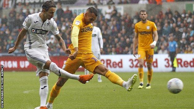 Bersant Celina (left) takes a shot against Preston