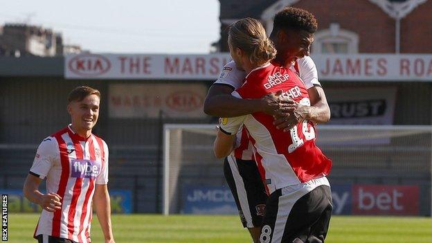 Exeter's players celebrate