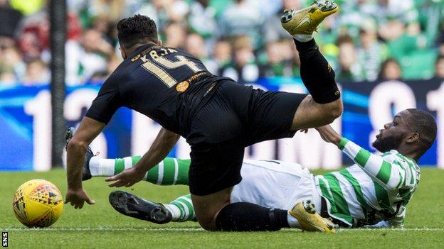 Celtic's Olivier Ntcham challenges Egli Kaja of Livingston