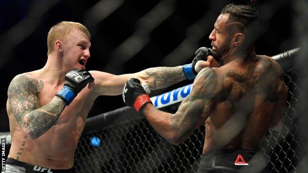 Mason Jones in action against Mike Davis