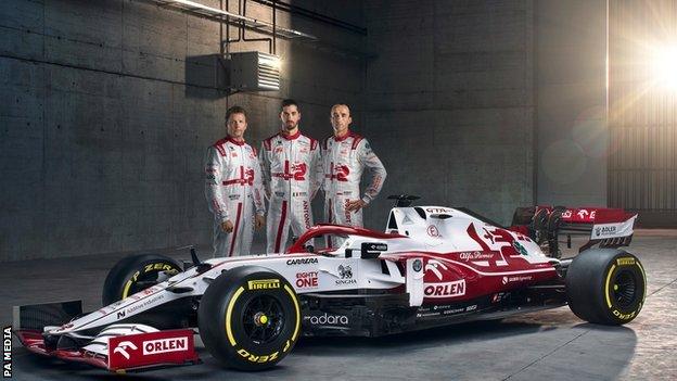 Alfa Romeo drivers Kimi Raikkonen, Antonio Giovinazzi and Robert Kubica next to the ORLEN C41