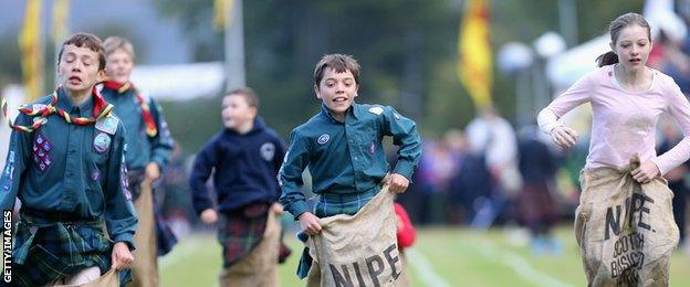 Children competing in a sack race