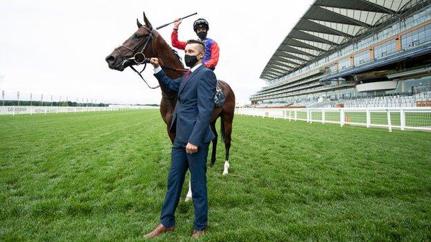 James Doyle, who won earlier on Lord North, celebrates with Tactical