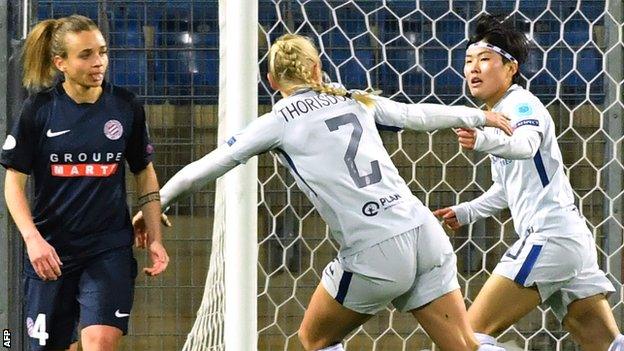 Ji So-Yun (right) celebrates her goal